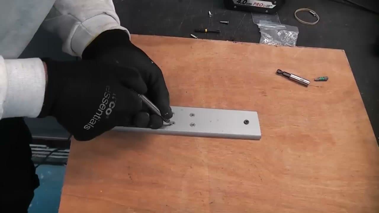 Step 5: Step 5: Walk it loose with a spring-loaded center punch
