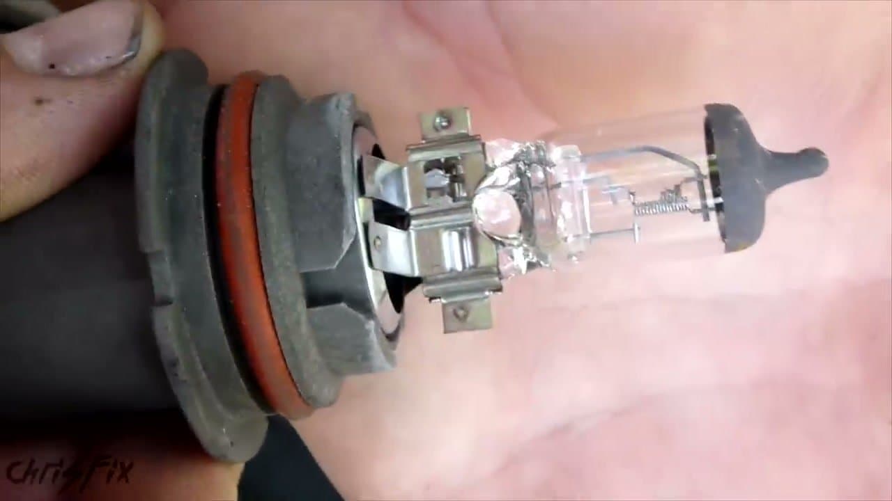Step 4: Step 4: Pull the old bulb out and inspect the filament