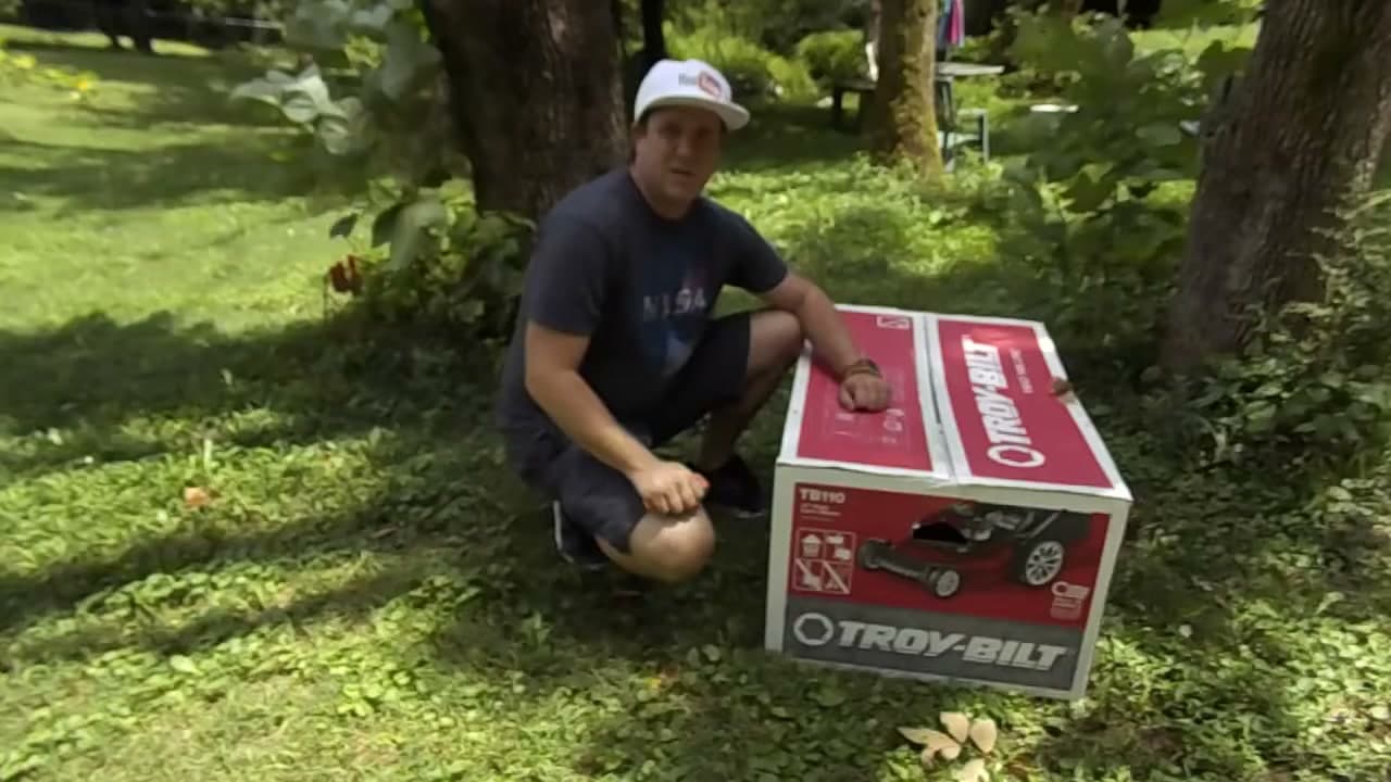 Step 1: Step 1: Unbox the mower and lay out the parts