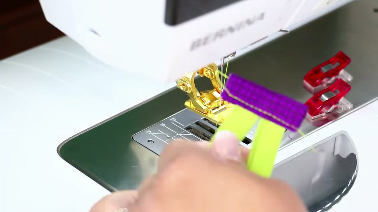 Step 2: Topstitch a Folded Fabric Tab Onto the End of the Zipper - How to Sew a Zipper Pouch
