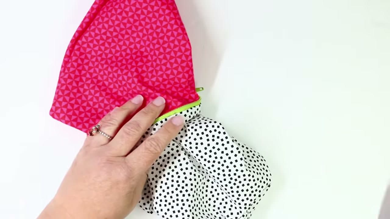 Step 8: Pull the Outer Fabric Right Side Out Through the Lining - How to Sew a Zipper Pouch