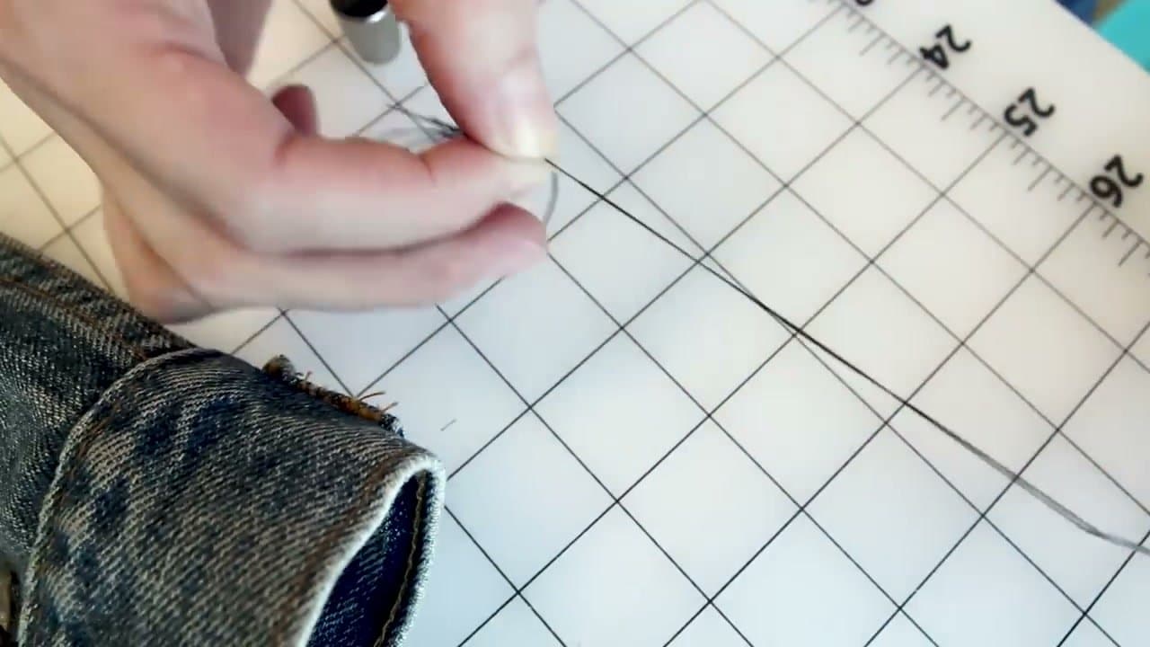 Step 3: Step 3: Tie a knot at the end of the thread