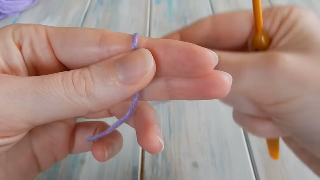 Step 2: Drape the Tail Over Your Fingers - How to Make a Slip Knot for Crochet