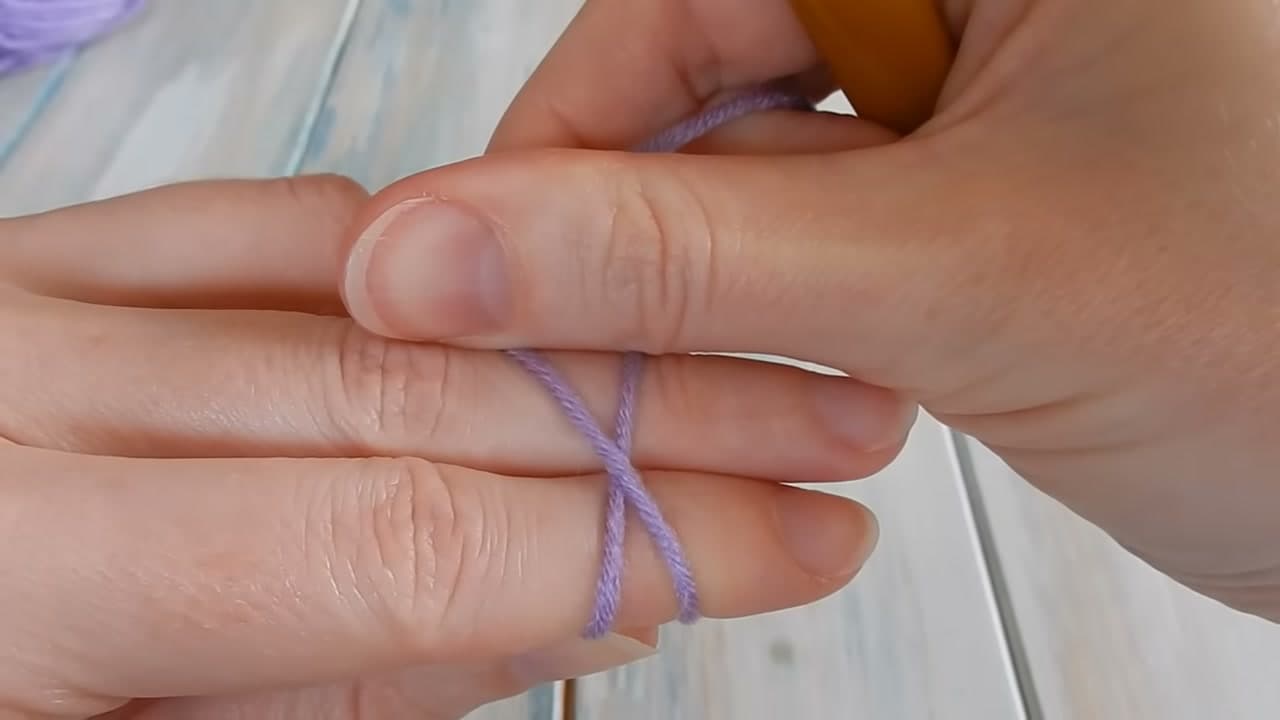 Step 4: Turn Your Fingers and Cross the Yarn - How to Make a Slip Knot for Crochet