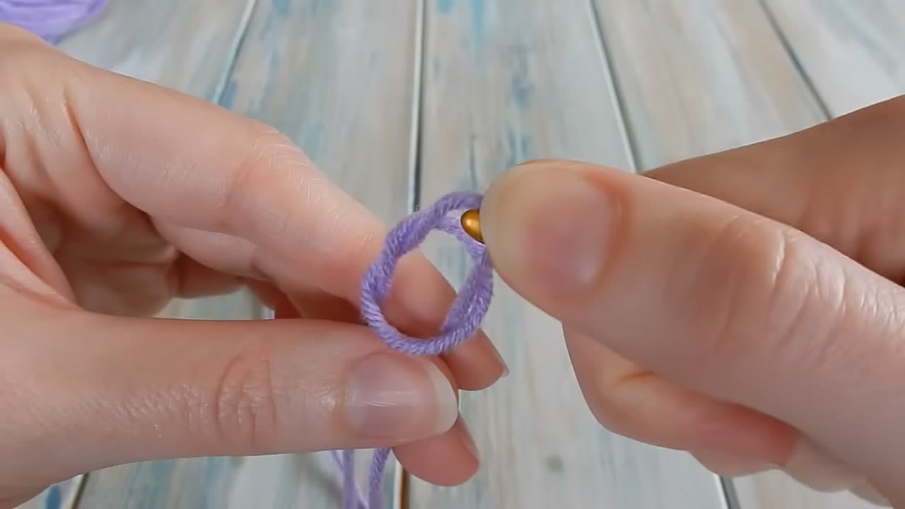 Step 7: Slip Your Fingers Out and Pull the Tail - How to Make a Slip Knot for Crochet