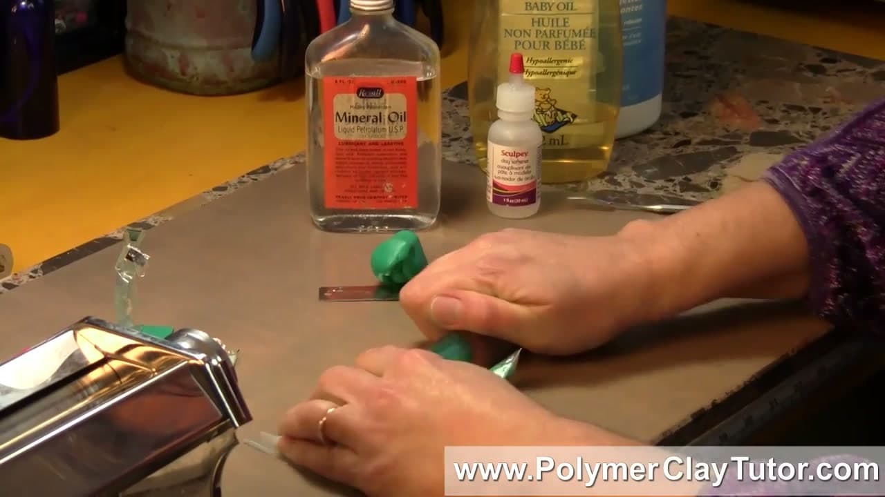 Step 5: Mash the Clay Through the Bag With a Roller