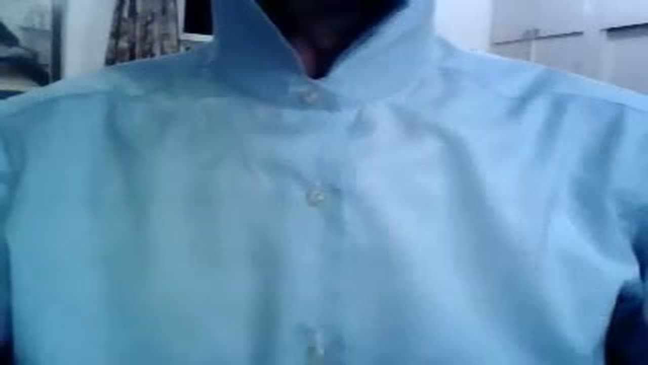 Step 1: Set Up in Front of a Mirror with the Collar Up