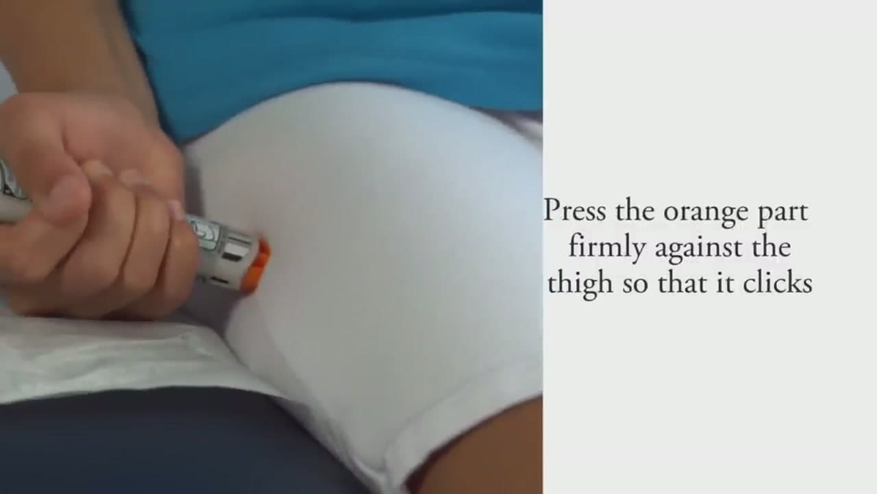 Step 4: Step 4: Press the Orange Tip Firmly Into the Outer Thigh
