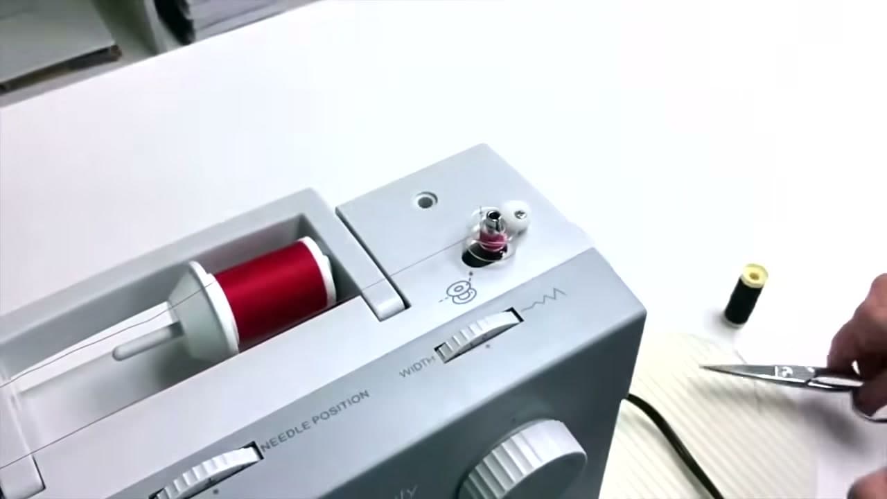 Step 6: Push the Spindle Across - How to Wind a Bobbin