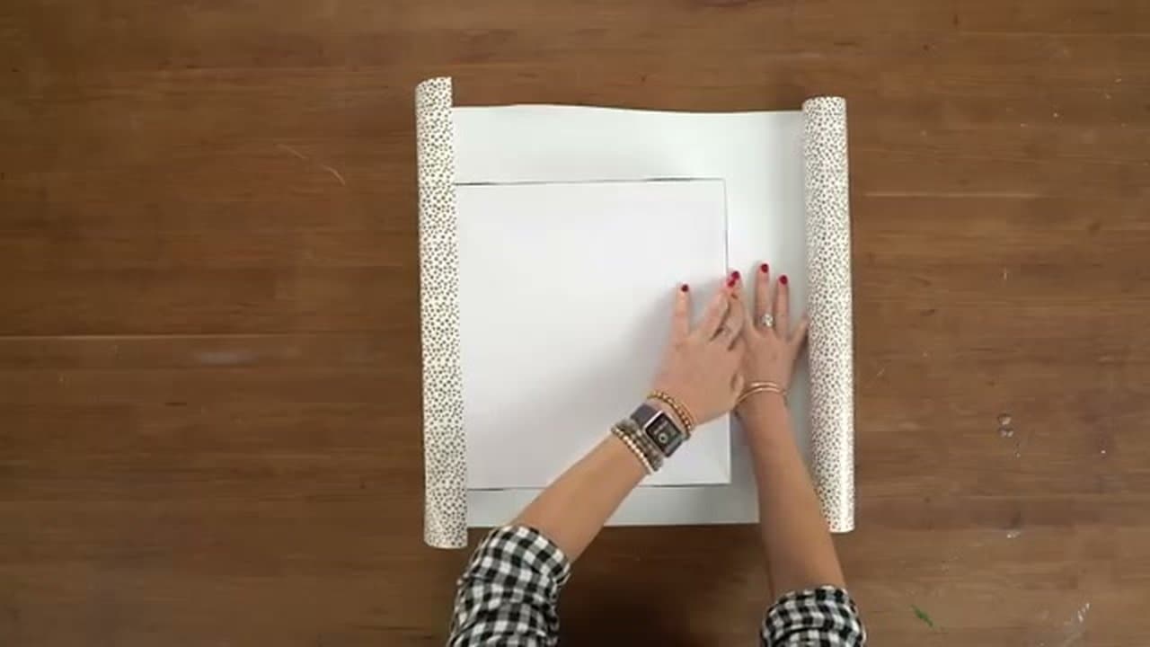 Step 2: Fold the First Side and Tape It Down