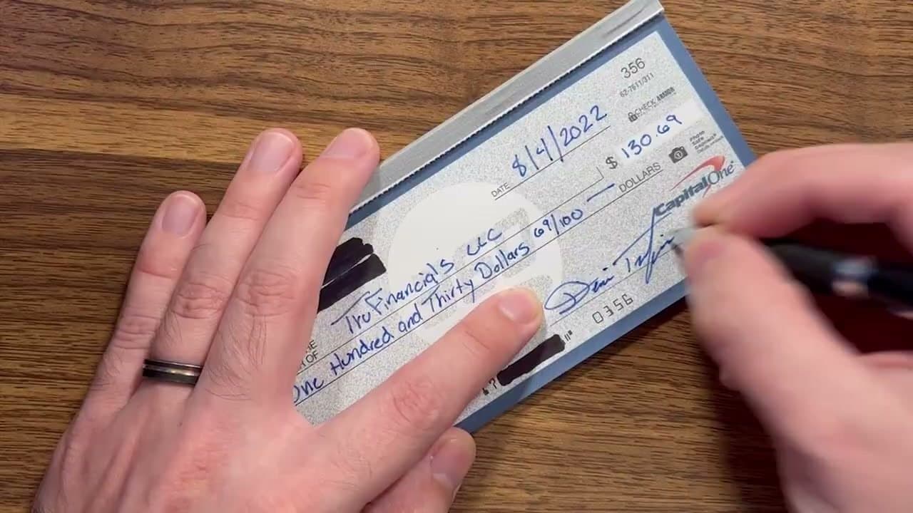 Step 7: Sign the Check