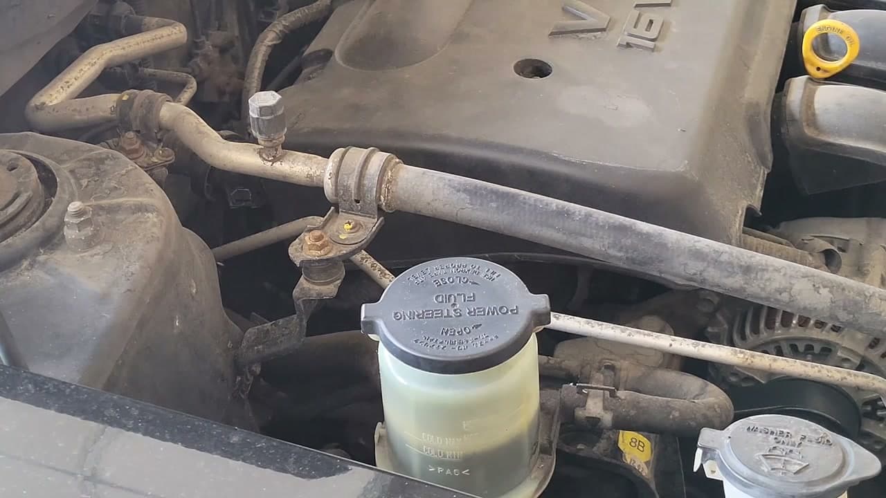 Step 1: Step 1: Park Safely and Locate the Power Steering Reservoir