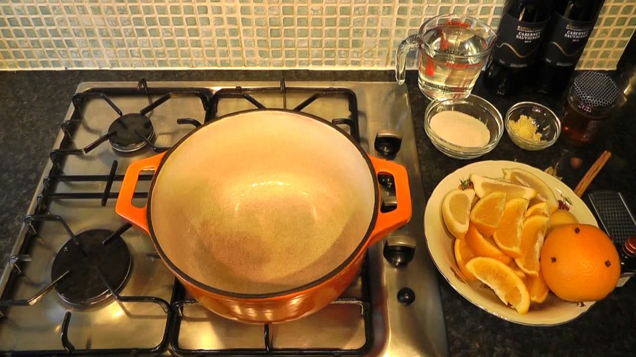 Step 1: Slice the Oranges and Lemons and Stud One Orange With Cloves - How to Make Mulled Wine