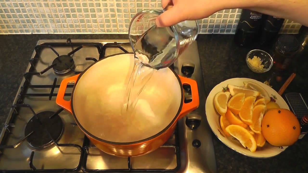 Step 2: Pour a Pint of Water Over the Sugar in the Pan - How to Make Mulled Wine