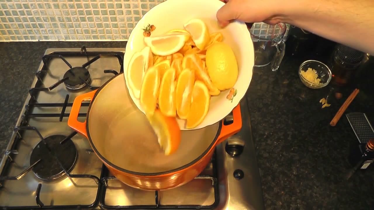 Step 3: Tip the Citrus Into the Pan - How to Make Mulled Wine