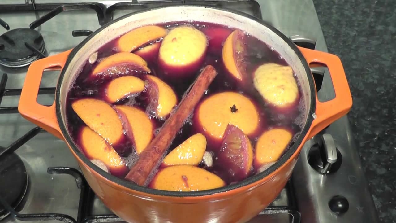 Step 6: Simmer the Wine With the Orange Slices and Cinnamon Stick - How to Make Mulled Wine