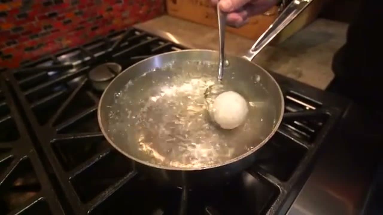 Step 4: Step 4: Lower eggs in and set timer for 5 minutes