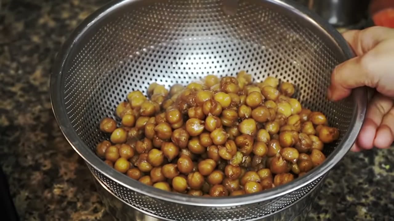 Step 6: Strain the Chickpeas and Save the Liquor - How to Make Chana Masala