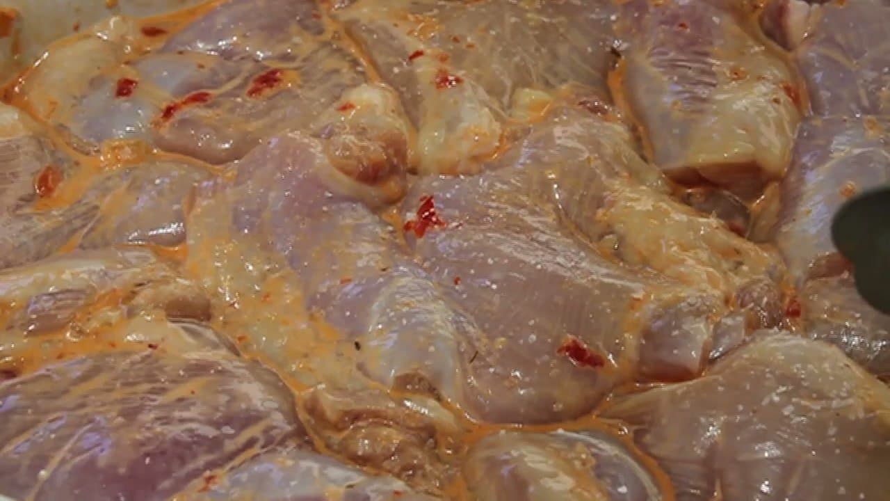 Step 4: Step 4: Salt the Thighs and Place Smooth Side Down