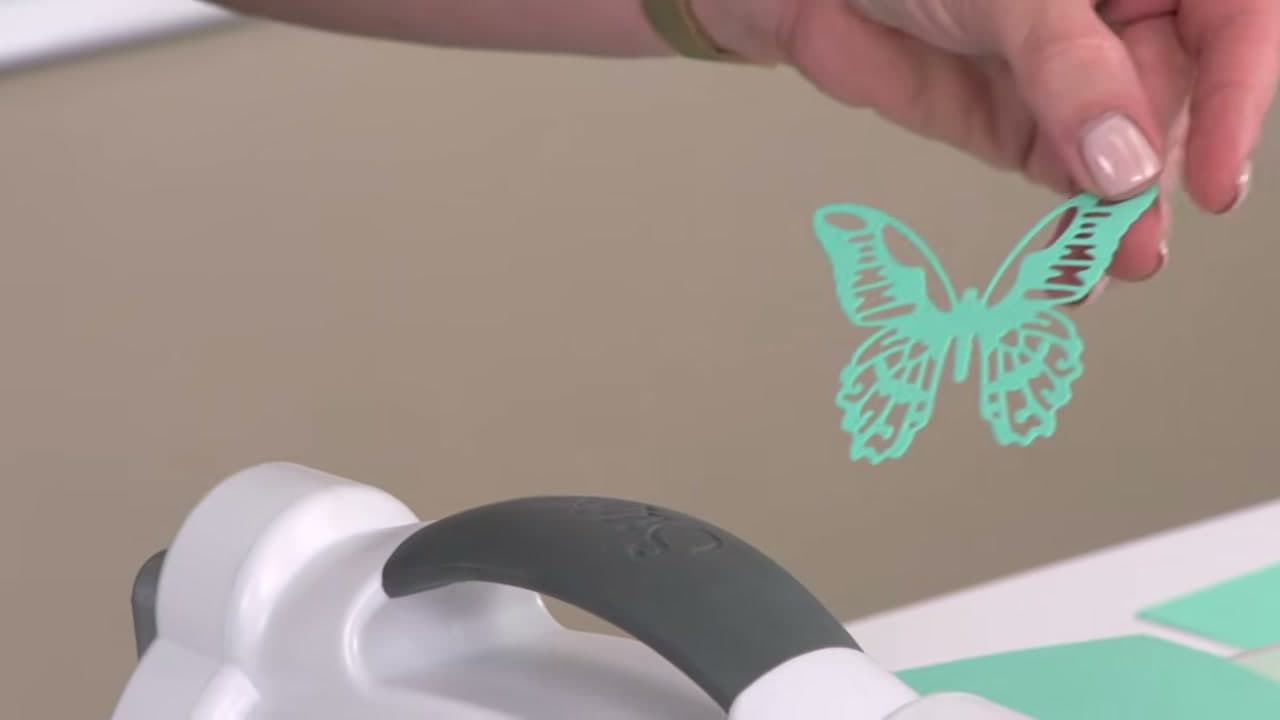 Step 4: Crank It Through and Lift the Die Off - How to Use a Die Cutting Machine