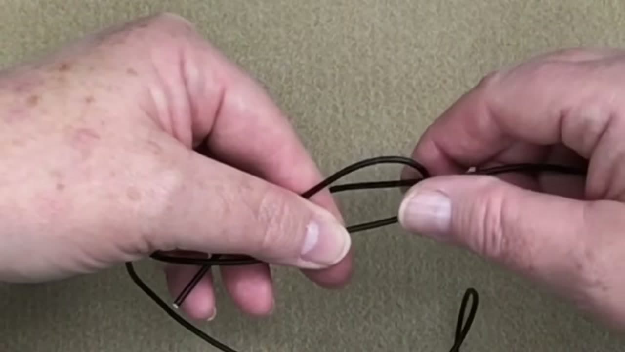 Step 2: Overlap the Two Ends - How to Tie a Bracelet Knot (Adjustable Sliding Knot)