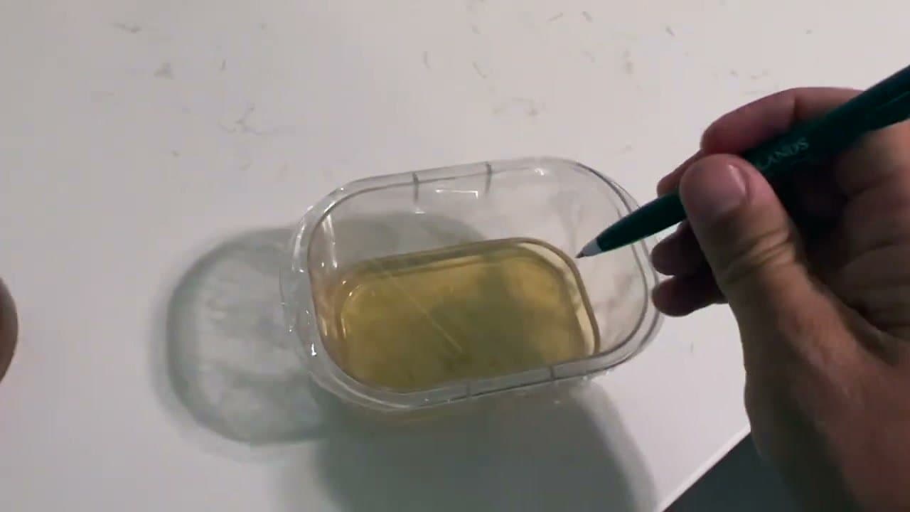 Step 3: Step 3: Poke holes in the wrap with a pen