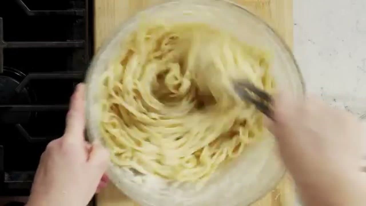 Step 5: Add the Cheese Gradually, Stirring Constantly