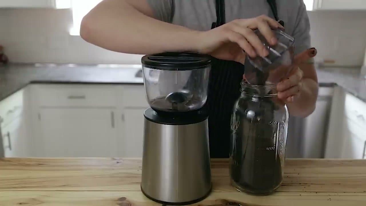 Step 2: Step 2: Pour the grounds into a half-gallon mason jar