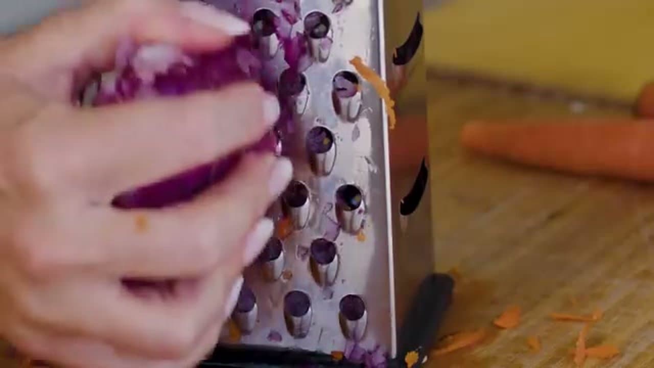 Step 2: Step 2: Shred Red Cabbage, Grate Carrots and Red Onion
