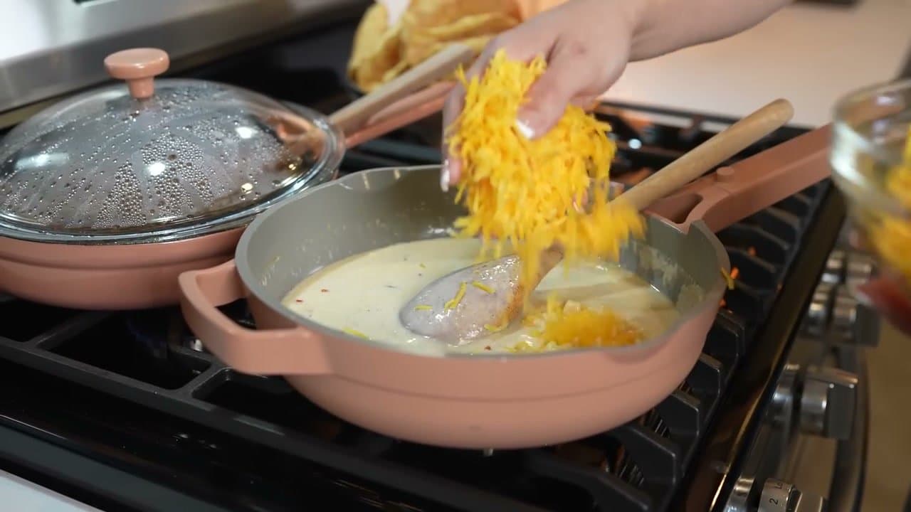 Step 7: Step 7: Melt in the shredded cheddar