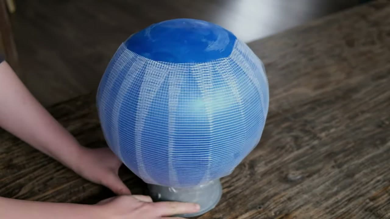 Step 1: Step 1: Wrap the Balloon Mold in Mesh
